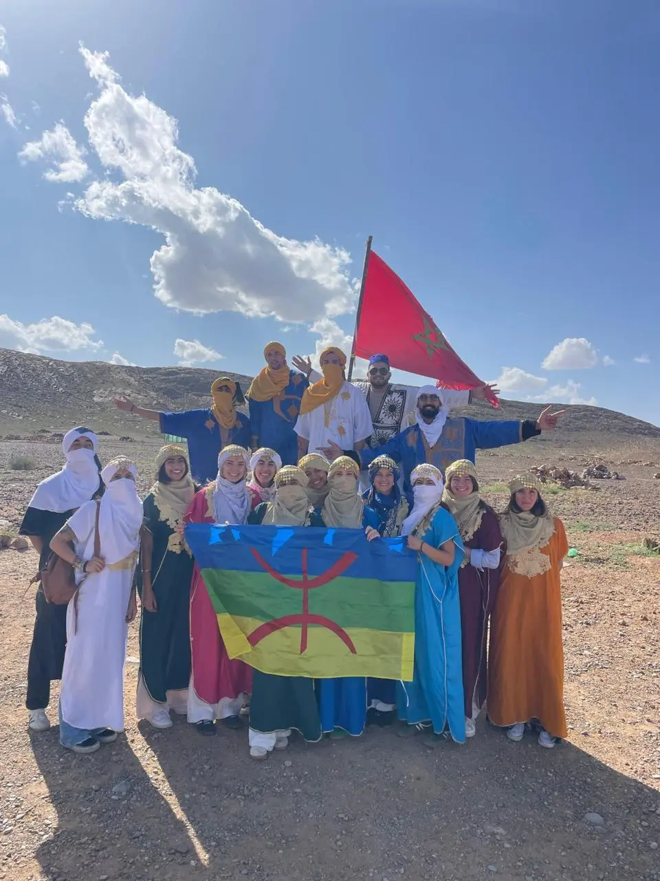 A group of travellers in the Moroccan desert